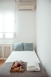 Łóżko lub łóżka w pokoju w obiekcie My City Home - Amplio apartamento en Salamanca