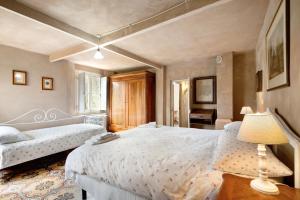A bed or beds in a room at Agriturismo Il Filo di Paglia