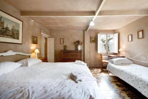 A bed or beds in a room at Agriturismo Il Filo di Paglia
