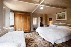 A bed or beds in a room at Agriturismo Il Filo di Paglia