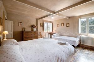 A bed or beds in a room at Agriturismo Il Filo di Paglia