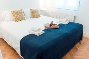 Łóżko lub łóżka w pokoju w obiekcie My City Home - Amplio apartamento en Salamanca