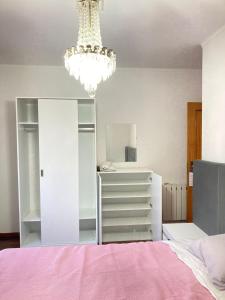Postel nebo postele na pokoji v ubytování Hospedaria Cidade Berço + 2 fotografie