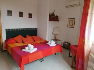 A bed or beds in a room at villetta Monte