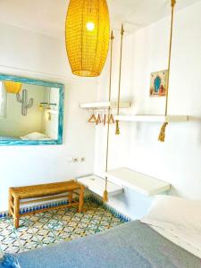 Postel nebo postele na pokoji v ubytování Hôtel Emeraude Essaouira