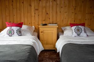 Posteľ alebo postele v izbe v ubytovaní Apartamenty Sosna