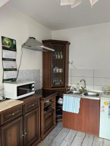 Kuchyňa alebo kuchynka v ubytovaní Apartament Kościelisko