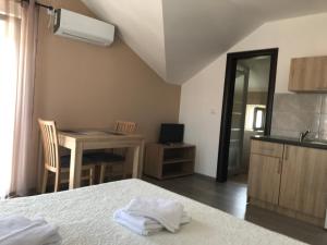 Postel nebo postele na pokoji v ubytování SREBRNA Kap