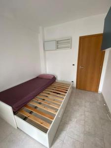 Tempat tidur dalam kamar di Vacanze Romane ~ Cozy Flat
