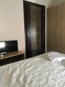 Postel nebo postele na pokoji v ubytování SREBRNA Kap