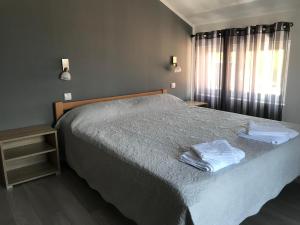 Postel nebo postele na pokoji v ubytování SREBRNA Kap