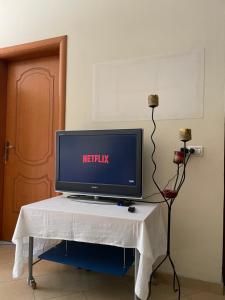 TV a/nebo společenská místnost v ubytování Villa Meka