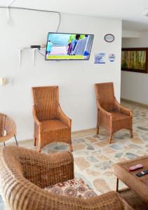 TV a/nebo společenská místnost v ubytování Hotel Acapulco Caucasia
