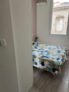 Posteľ alebo postele v izbe v ubytovaní Hyper Centre Ville, le Brion