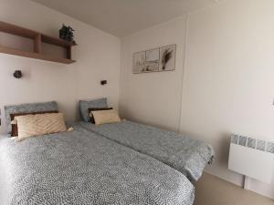 Postel nebo postele na pokoji v ubytování Chalet Hohllay