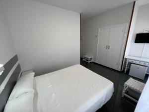 Postel nebo postele na pokoji v ubytování Hostal Venta Del Sol
