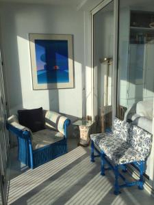 A seating area at Marina Capo Pino