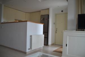Televízia a/alebo spoločenská miestnosť v ubytovaní Cosy apartamento en Sagaró, Costa Brava