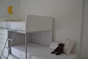 Posteľ alebo postele v izbe v ubytovaní Cosy apartamento en Sagaró, Costa Brava