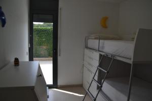 Posteľ alebo postele v izbe v ubytovaní Cosy apartamento en Sagaró, Costa Brava