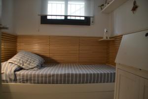 Posteľ alebo postele v izbe v ubytovaní Cosy apartamento en Sagaró, Costa Brava