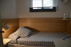 Posteľ alebo postele v izbe v ubytovaní Cosy apartamento en Sagaró, Costa Brava