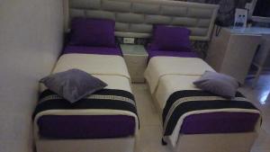 Krevet ili kreveti u jedinici u okviru objekta Beirut Hotel 1