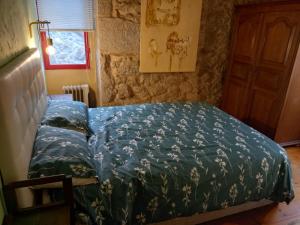 Cama o camas de una habitación en A CASA de FLORINDA