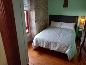 Cama o camas de una habitación en A CASA de FLORINDA
