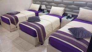 Krevet ili kreveti u jedinici u okviru objekta Beirut Hotel 1