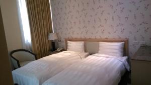 Letto o letti in una camera di A casa Hotel