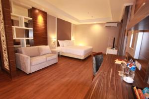 A seating area at Pranaya Boutique Hotel