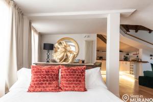 Postel nebo postele na pokoji v ubytování MURANO Suites BOUTIQUE Apartments