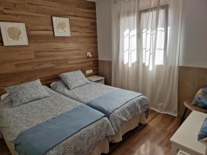 Postel nebo postele na pokoji v ubytování Poema de Liria + 20 fotografií