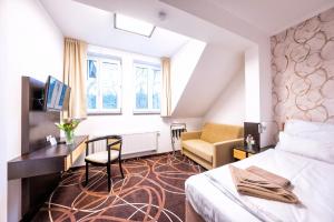 Posteľ alebo postele v izbe v ubytovaní Hotel Hubertus