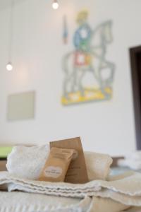 Cortile dei Giusti - Combo Guesthouse客房内的一张或多张床位