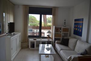 Posedenie v ubytovaní Cosy apartamento en Sagaró, Costa Brava