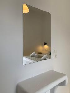 Postel nebo postele na pokoji v ubytování Juli’s Suites