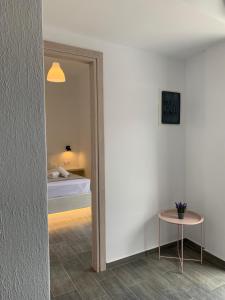 Postel nebo postele na pokoji v ubytování Juli’s Suites