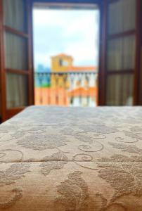 a close up of a table in a room with a window at La Llosa de Sámano in Castro-Urdiales