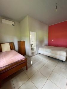 Katil atau katil-katil dalam bilik di Chácara recanto Feliz
