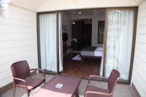 Postel nebo postele na pokoji v ubytování Hotel Pearls
