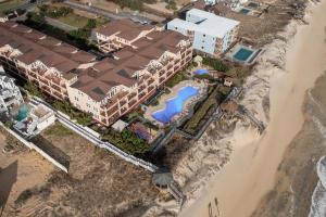 an overhead view of a resort on the beach at Croatan Surf Club by KEES Vacations in Kill Devil Hills