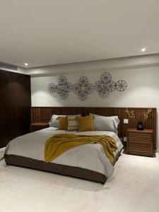 a bedroom with a large bed in a room at Departamento Playa Dorada Punta Mita, Beach Front in Punta Mita