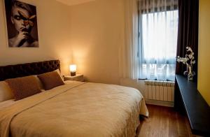 Un pat sau paturi într-o cameră la Apartment Leona