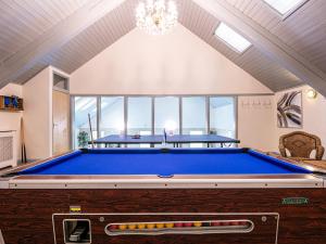 a pool table in a room with a ceiling at Pippinwell in Bakewell
