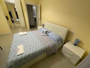 Postel nebo postele na pokoji v ubytování Residenza Punta Acquabella
