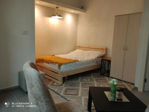 Ένα ή περισσότερα κρεβάτια σε δωμάτιο στο צימרים סוף העולם 2 +14 φωτογραφίες