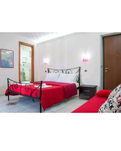 Ένα ή περισσότερα κρεβάτια σε δωμάτιο στο Casa Bacchilide