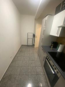 A kitchen or kitchenette at Apartment in Uerdingen,Monteure,Netflix, Prime